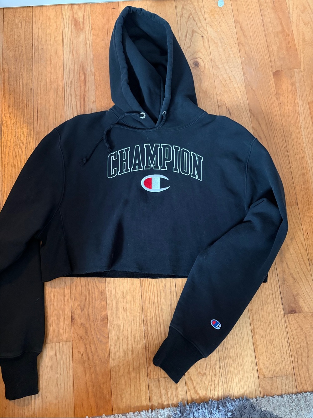 Champion Black Hoodie with Blue Logo Tag